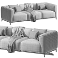 Elegant Modern Sofa In Neutral Colors With Decorative Pillows And Cozy Throw Blanket