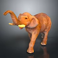 Brown Elephant Toy With Raised Trunk And Yellow Object In Mouth On Black Background