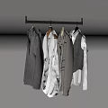 Metal Clothes Hanger With Hanging Sweaters Shirts And Jackets In Neutral Tones