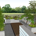 Beautiful Courtyard Garden With Wooden Deck Lush Green Plants Colorful Flowers And Black Fence