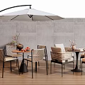 Outdoor Patio Table With Wicker Chairs White Arc Umbrella Gray Tile Wall And Wooden Floor