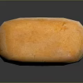 Fresh Golden Crusty Bread Loaf With Soft Interior On Black Surface