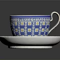 Ceramic Blue And White Patterned Cup With Matching Saucer And Floral Motifs