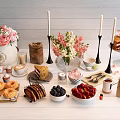 Delicious Assorted Food Spread With Donuts Sandwiches Cake Fresh Berries Flowers And Candles