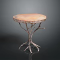 Unique Round Furniture Table With Orange Top And Branch Like Metal Legs
