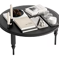 Black Round Coffee Table Featuring Books Candles Pinecones Tray And Cups 3d model