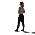 Woman Standing In White Tank Top And Black Leggings Holding Black Bottle Against White Background