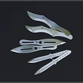 Sharp Sleek Silver Metal Daggers With Multiple Blades And Various Designs