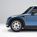 Blue Mini Style Car With Round Headlights White Roof And Front Grille Design