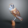 Lifelike Owl Sculpture With Intricate Feather Details Standing On Natural Wooden Base