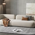 Beige Sofa with Brown Blanket Gray Cushion on Gray Rug Modern Art and Floor Lamp