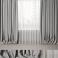 Gray Textured Curtains Draped With White Sheer For Window Interior Design