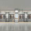 Modern Clothing Store Interior With Black Metal Racks Hanging Apparel Light Walls And Mirrors