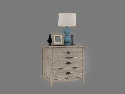 Wooden Bedside Table With Three Drawers Black Handles Blue Lamp White Shade And Photo Frame 3d model