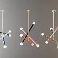 Colorful Modern Pendant Lights with Crossed Rods and White Spherical Ends for Contemporary Interiors