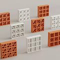 White And Orange Perforated Decorative Blocks With Various Geometric Hollow Patterns 3d model