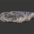 Natural Red Stone With Purple Specks And Rough Textured Surface For Decorative Use