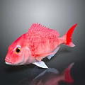 Decorative Red Fish Figurine With Yellow Eyes White Fins And Dark Background For Home Decoration