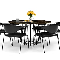 Round Marble Top Dining Table Set With Black Metal Leg Chairs And Yellow Flower Decor