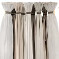 Elegant Curtains Display With Various Fabrics On Modern Golden Racks And Table