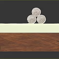 Wooden Storage Box With Light Green Mat And Three Rolled White Towels