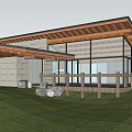 Modern Boutique Guesthouse Building With Wooden Roof Large Glass Windows Green Lawn And Surrounding Trees