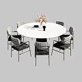 Round White Dining Table Set With Six Woven Chairs And Decorative Plant 3d model