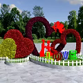 Creative Bush Sculptures Featuring Heart Shapes Red Figures and LOVE Letters in Park