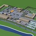 Aerial View Of Large Complex With Multiple Buildings Parking Areas Green Spaces And River