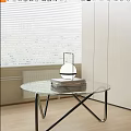 Modern Glass Round Coffee Table With Books Stack And Table Lamp By Window Blinds 3d model