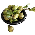 Green Pears with Fresh Leaves in Black Plate on White Background
