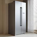 Modern Stainless Steel Double Door Refrigerator Freezer In Kitchen With Curtains And Window