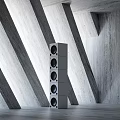 Modern Geometric Room Interior With Tall Speaker Towers And Concrete Walls Design