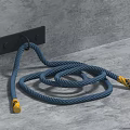 Durable Household Hooks Holding Blue Ropes With Yellow Ends On Gray Wall