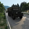 Military Trucks In A Convoy Driving On The Highway With Mountains And Trees