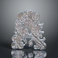Silver Decorative Metal Ornament With Intricate Carved Scroll Patterns And Symmetrical Design 3d model
