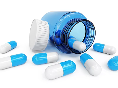 Medical Device Open Blue Bottle With Scattered Blue And White Capsules 3d model