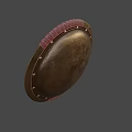 Ancient Bronze Shield with Red Leather Edging and Metal Rivets as Historical Weapon