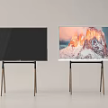 Two Televisions With Black Screen Off And White Frame Displaying Mountain Scenery On Wooden Stand
