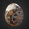 Intricately Decorated Egg Featuring Geometric Patterns In Brown And White Tones