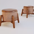 Two Wooden Stools With Round Seat And Curved Legs Design