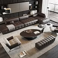 Modern Brown Leather Sectional Sofa With Round Wooden Coffee Table And Accent Chairs On Area Rug