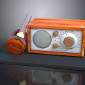 Classic Computer Headphones With Wooden Radio On Black Platform