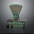 Vintage Green Platform Scale With Metal Weights On Dark Surface