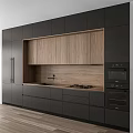 Modern Kitchen Featuring Black And Wooden Cabinets With Countertop Sink Stove And Oven