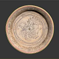 Traditional Pink And Beige Carved Circular Plate With Central Design And Decorative Edges