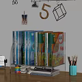 Neatly Arranged Books And Magazines On Clear Bookshelf With Blue Pen Holder And Wall Decor 3d model