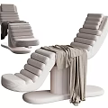 Modern Lounge Chair with Layered Cushions Light Beige and Cozy Gray Blanket on Circular Base