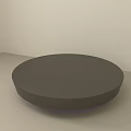 Modern Circular Coffee Table With Smooth Dark Surface In Minimalist Room 3d model