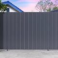 Sleek Modern Gate With Dark Gray Vertical Slats And White Pillars For Residential Entrance
